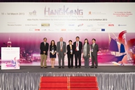 (From left) Prof. Chan Yuk-shee, President, Lingnan University; Ms. Phoebe Shing, Assistant Manager for Conventions of the Hong Kong Tourism Board; Dr. Richard Armour, Secretary-General of the University Grants Committee Secretariat of the Hong Kong SAR; Mrs. Cherry Tse, Permanent Secretary for Education of the Hong Kong SAR Government; and Ms. Michelle Li (second from right), Deputy Secretary for Education of the Hong Kong SAR Government take a group photo with Prof. Joseph Sung and Prof. Gordon Cheung.